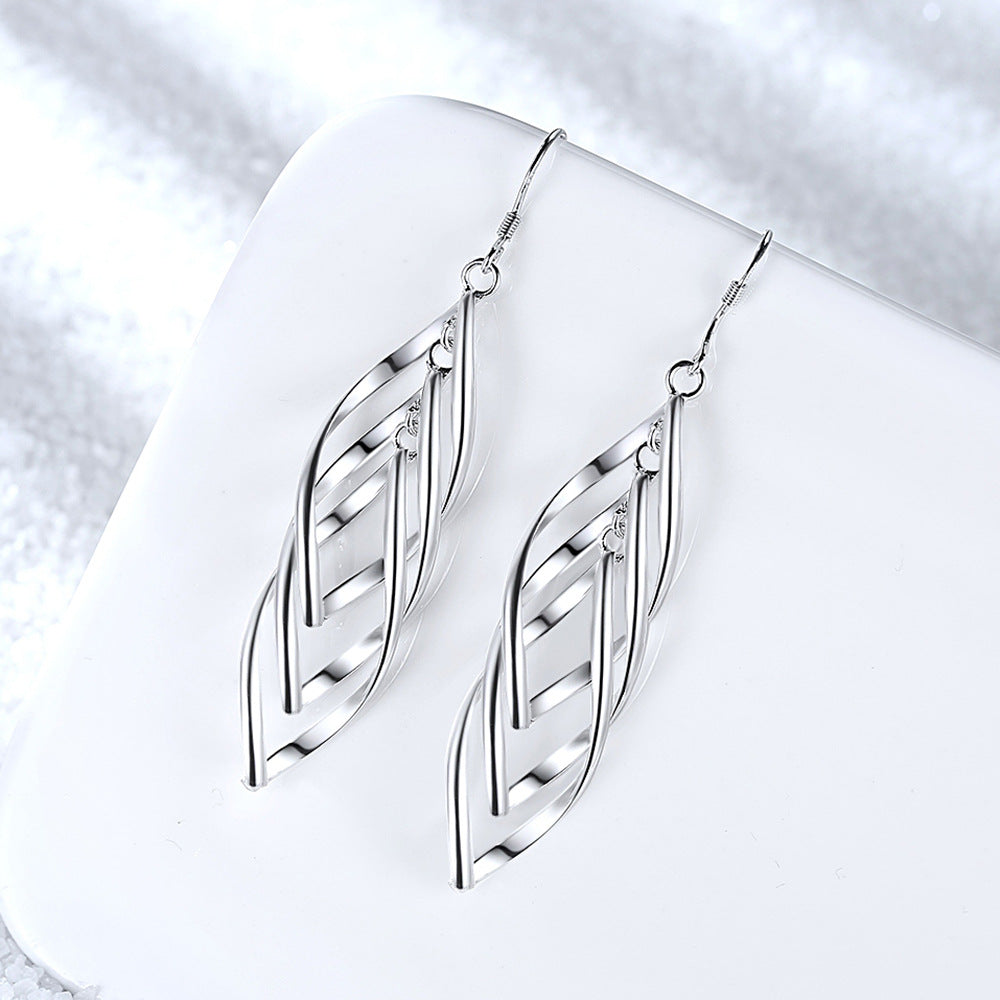 Aretes Solenne Onda Tejida | Oro blanco