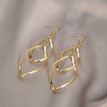 Aretes Minimalistas con Dije Colgante | Oro
