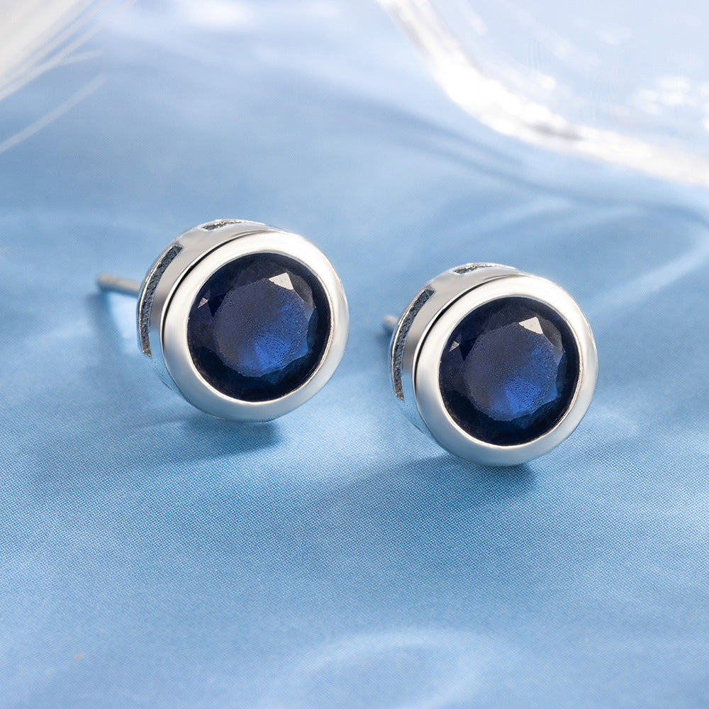 Aretes de botón de Zafiro en Oro blanco