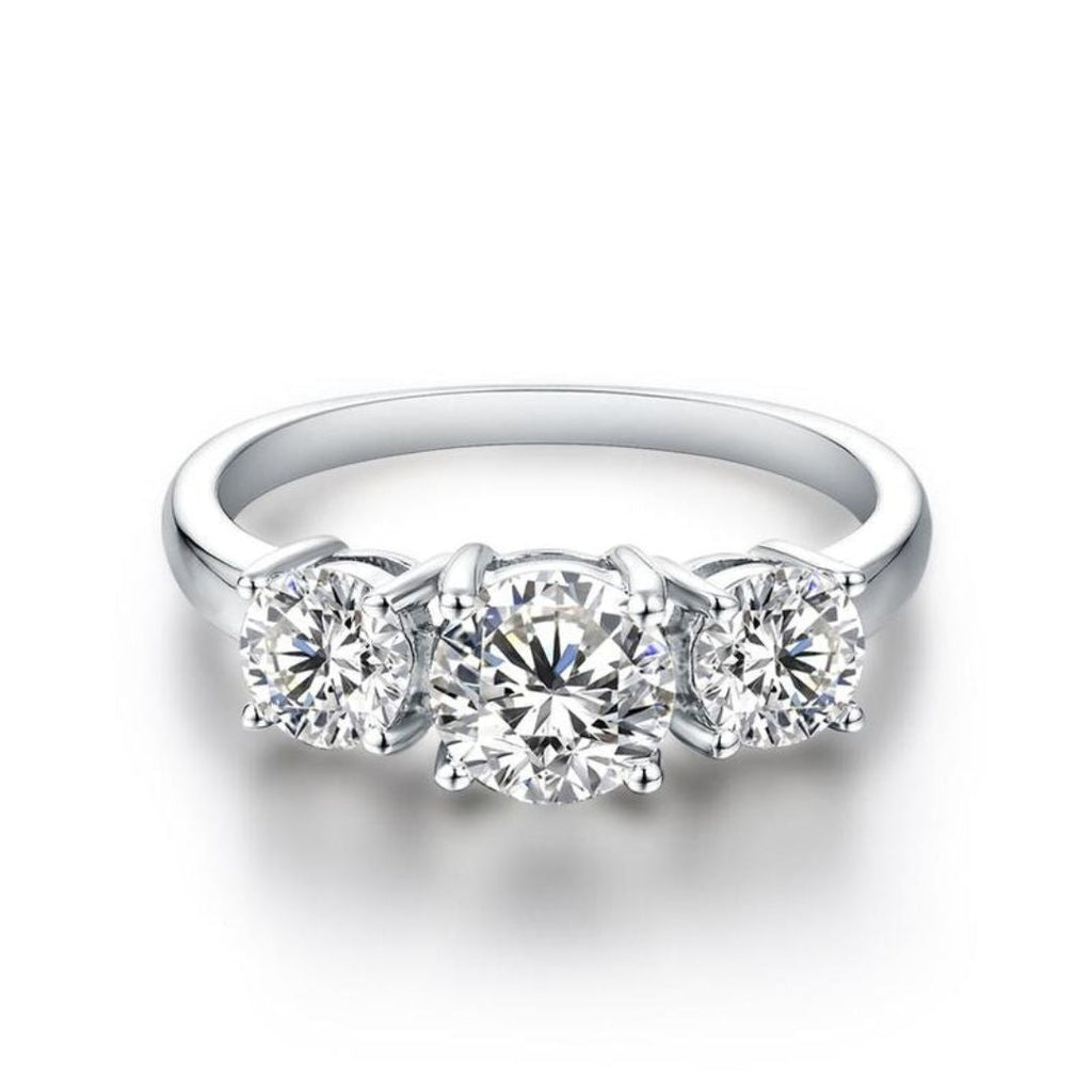 Anillo Clare Triple Piedra | Oro blanco