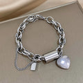 Pulsera Gruesa con Corazón | Oro blanco