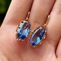 Aretes Flor Azul Dorada | Oro
