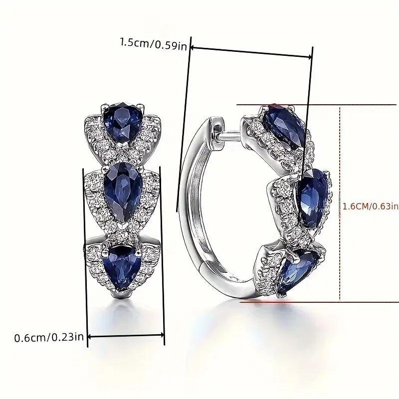 Aretes Escudo Zafiro Real | Oro blanco