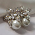 Aretes Flor Perla | Oro blanco