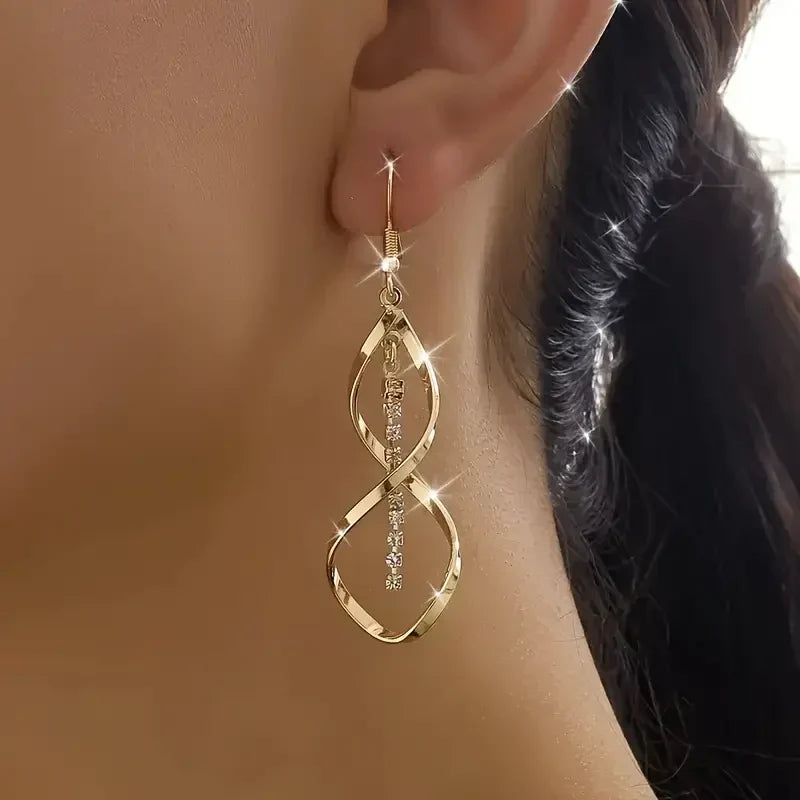 Aretes Espiral Rayo de Sol - Oro