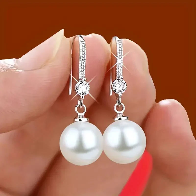 Aretes de Zirconia Perla con Oro Blanco